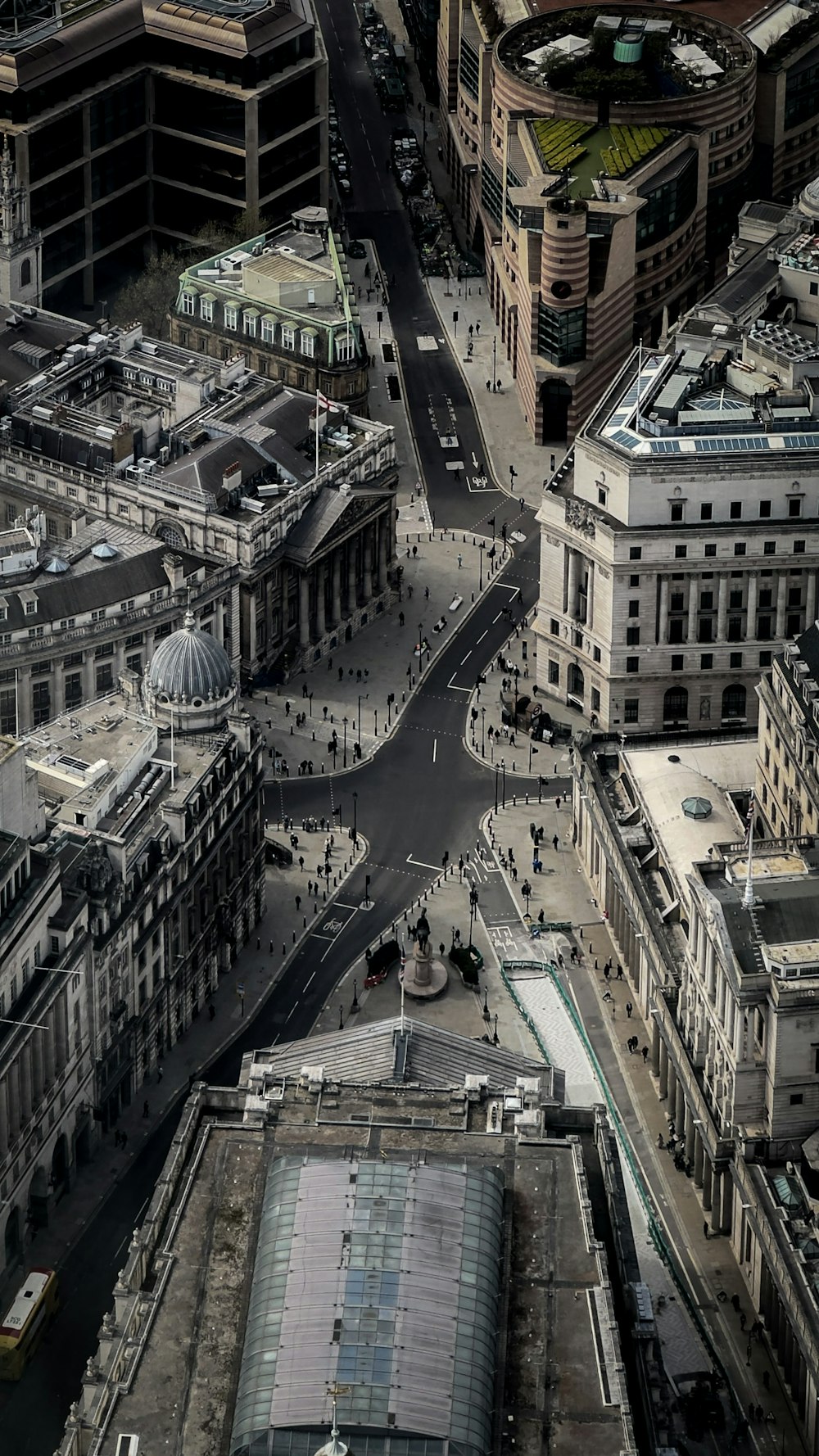 an aerial view of a city street and buildings