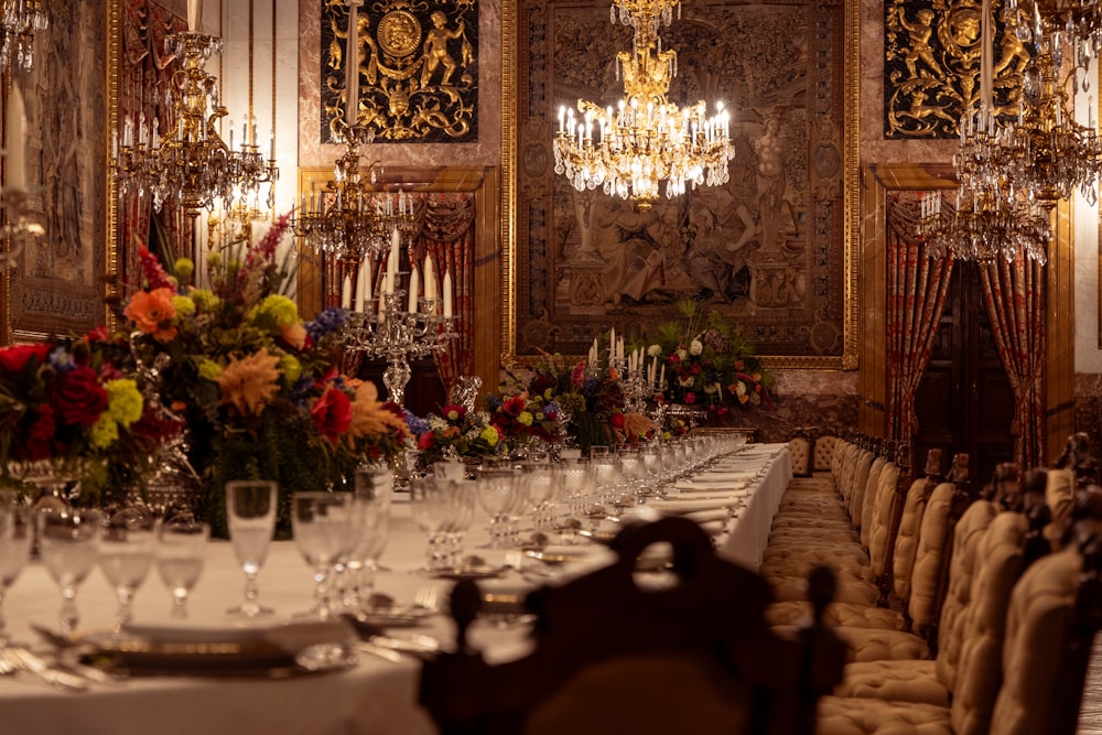 a long table with a bunch of glasses on it