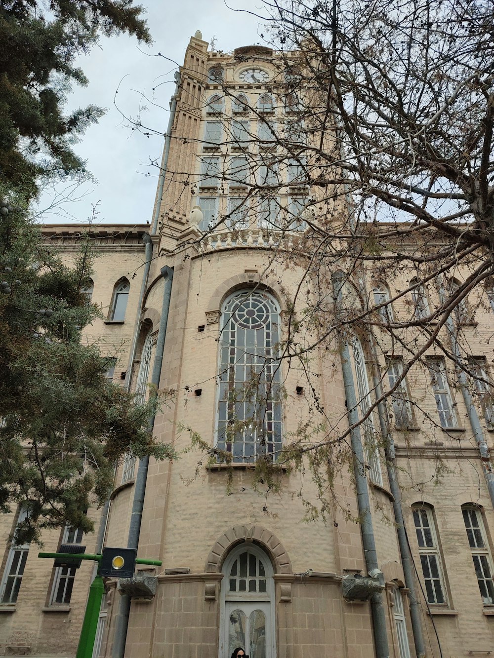 a tall building with a clock on the front of it