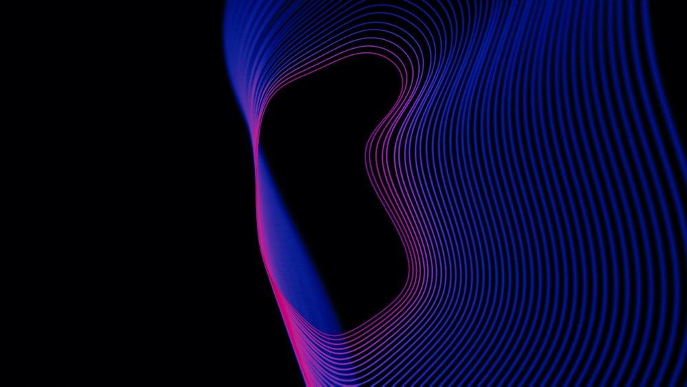 a black background with blue and pink lines