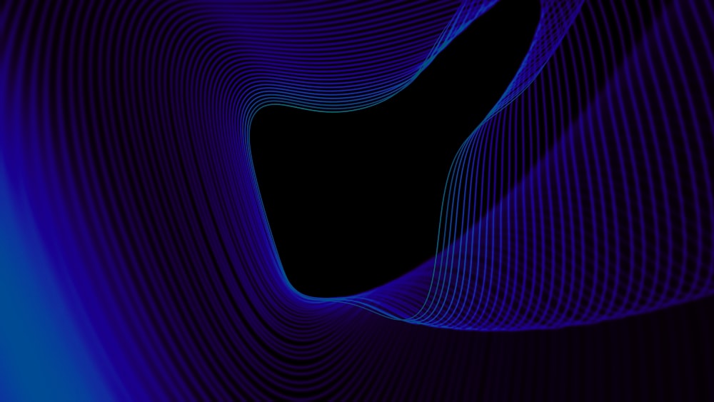 a blue and black background with wavy lines