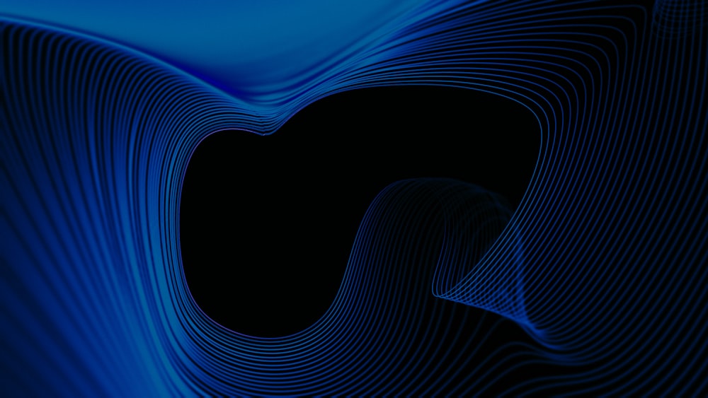 a black and blue background with wavy lines