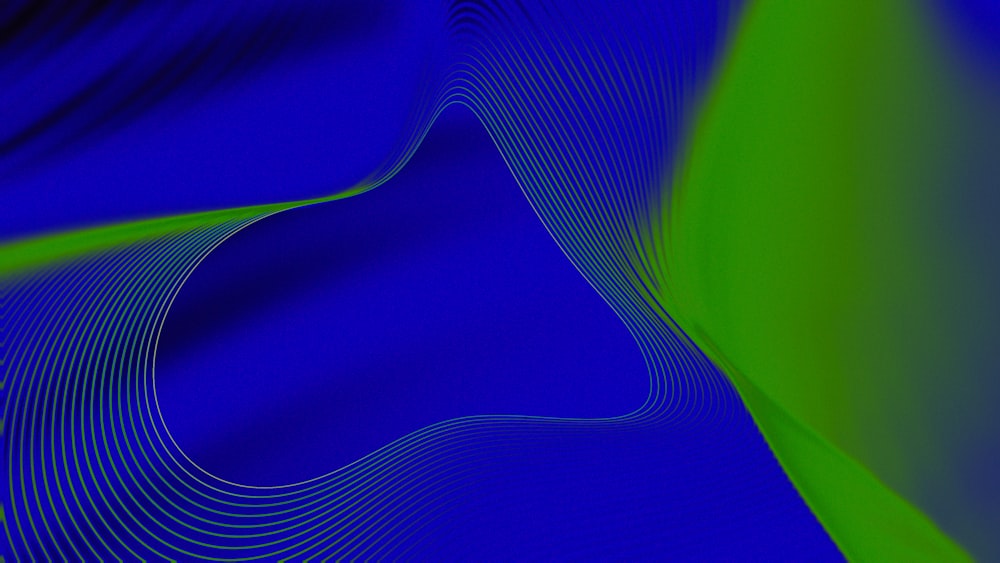 an abstract blue and green background with wavy lines