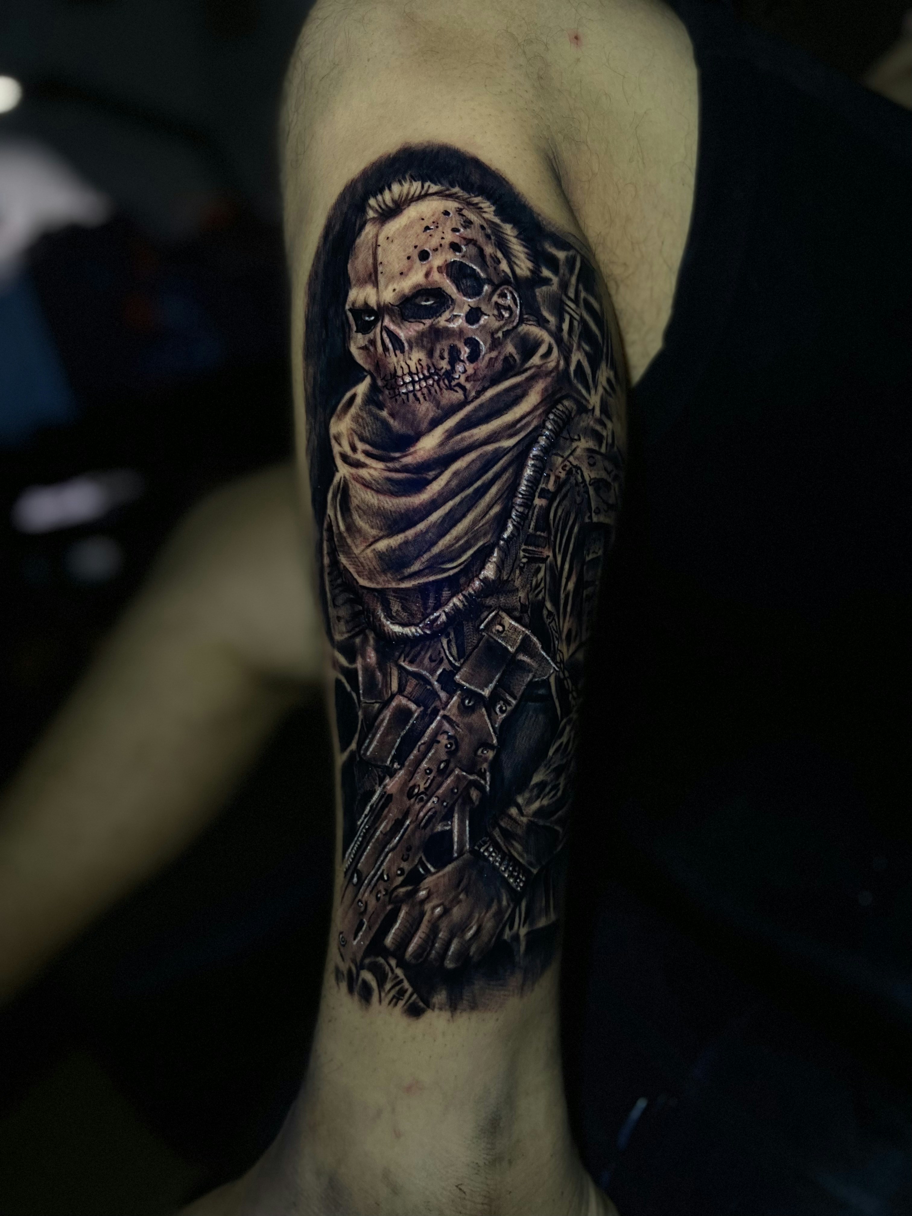 a person with a tattoo on their arm