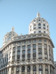 a large building with a clock on the front of it