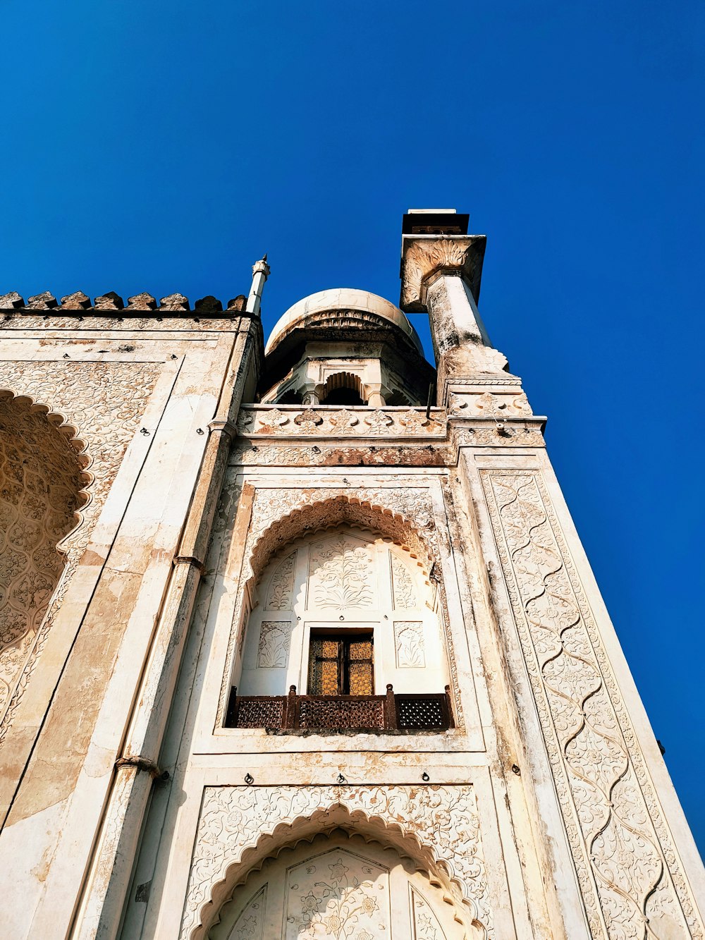 a tall building with a clock on the side of it