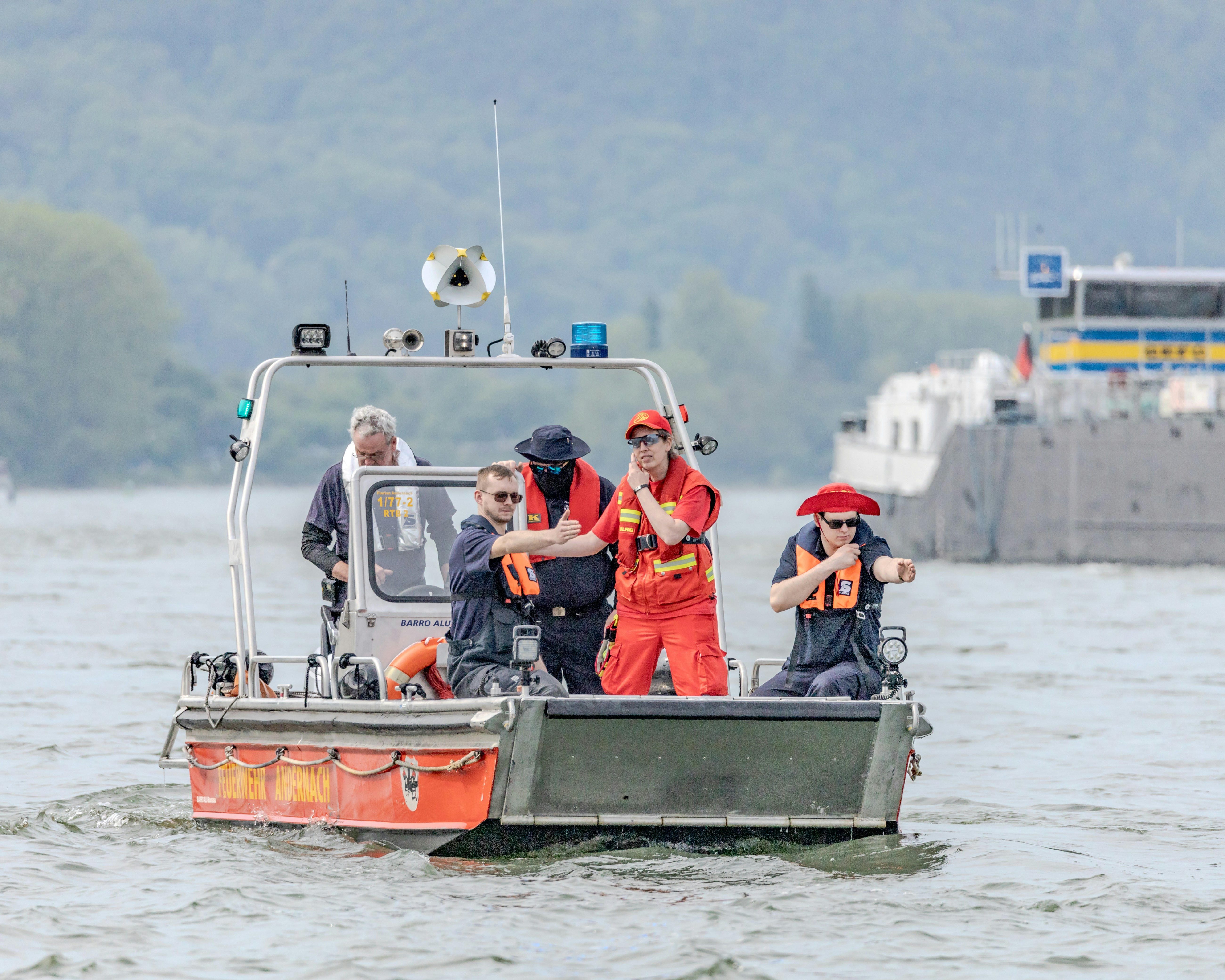 a group of people on a boat in the water