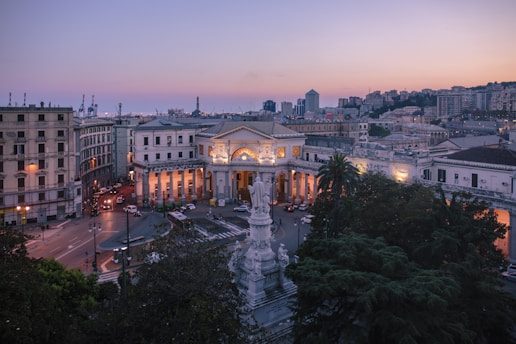 a view of a city at dusk from above