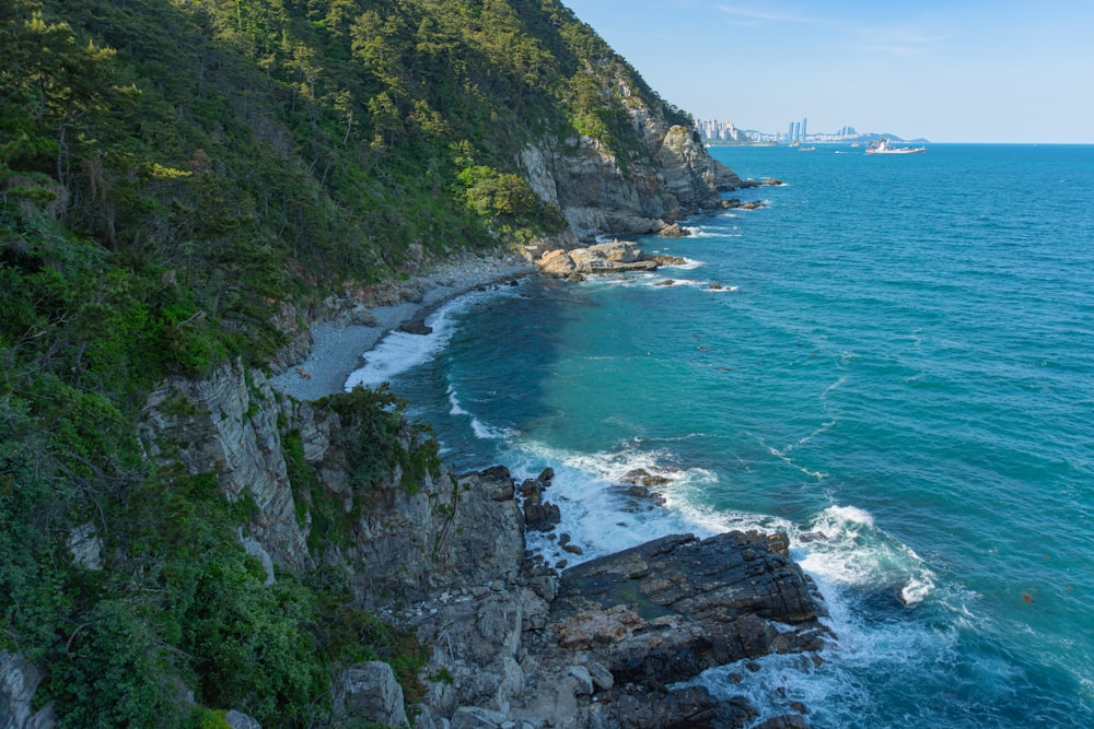 a view of the ocean from the top of a cliff