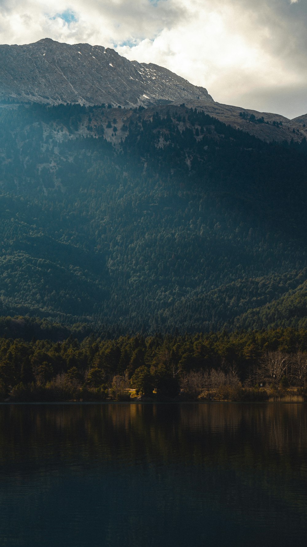 a mountain with a lake in front of it