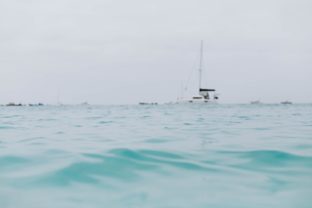 a blurry photo of a boat in the ocean