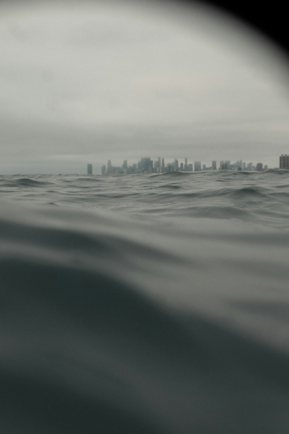 a view of a city from the ocean