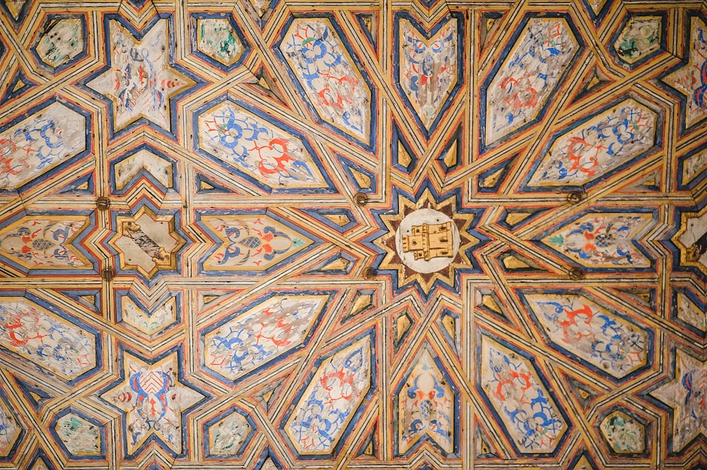 a close up of a decorative ceiling in a building