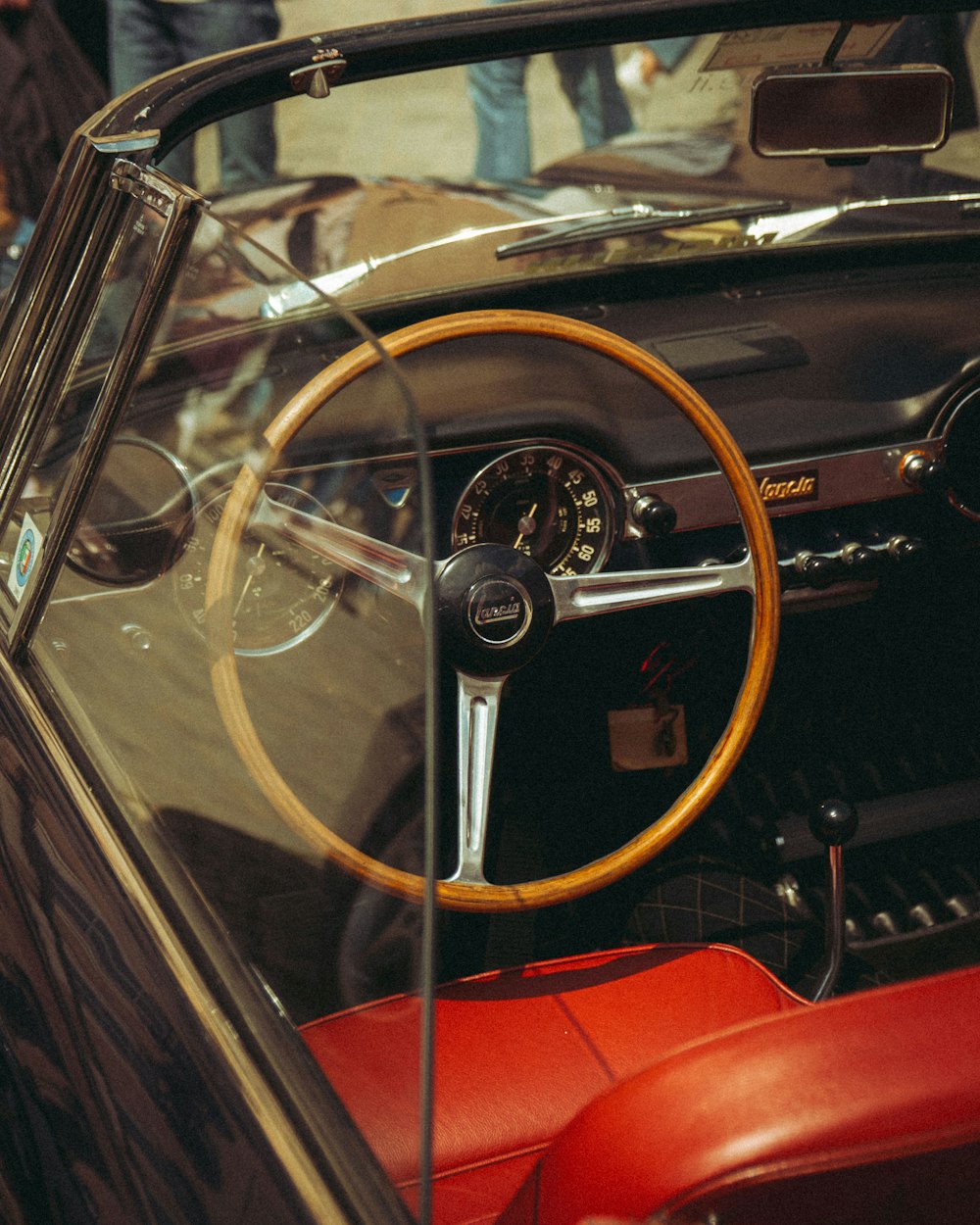 a car with a steering wheel and a dashboard