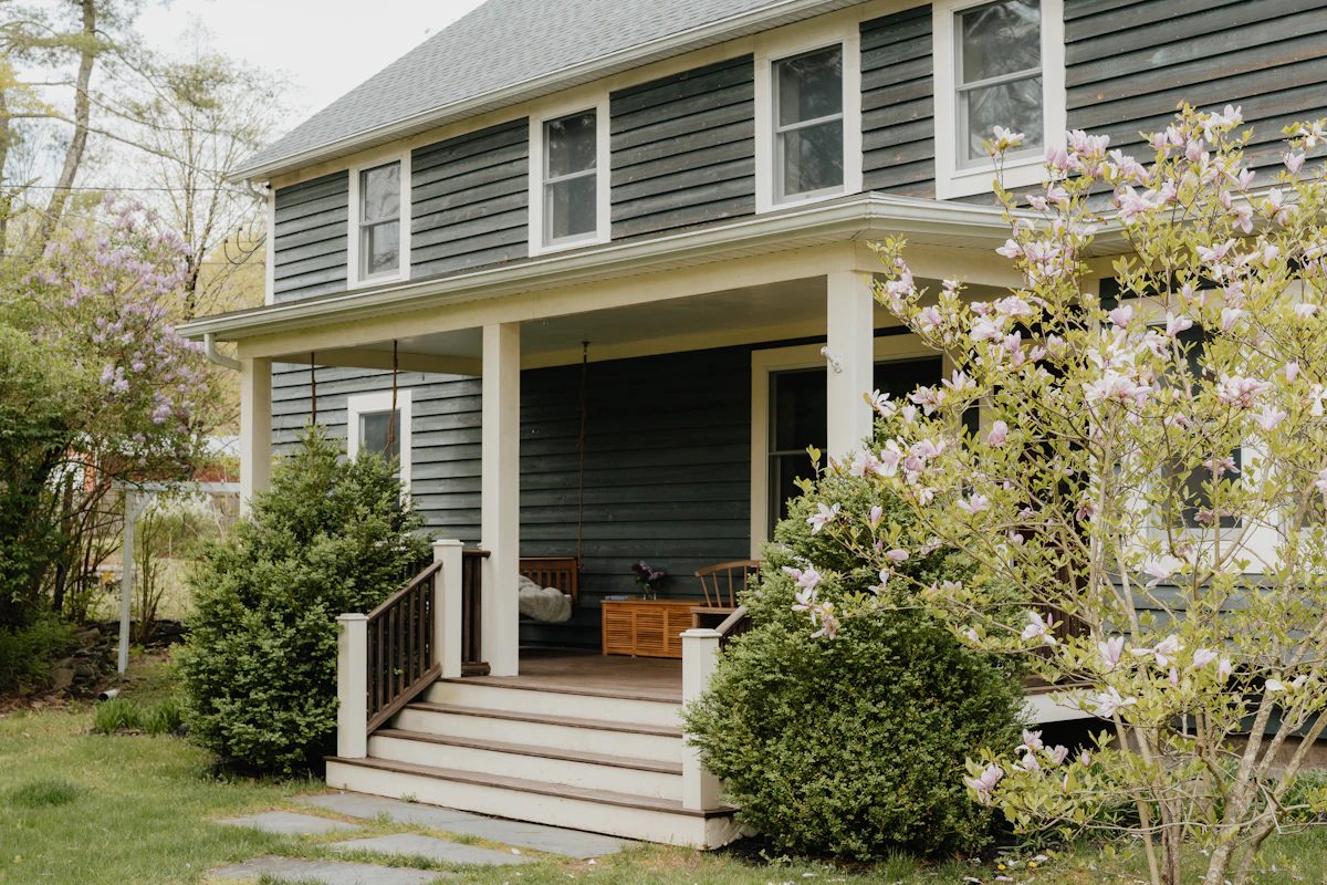A cozy home with a welcoming front porch, ready to sell