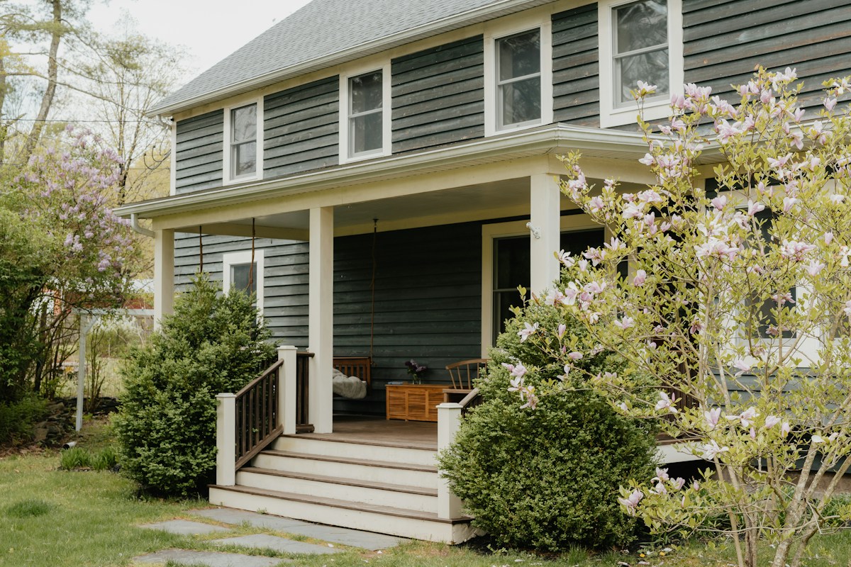 Front porch with steps and a welcoming entrance to a residential home