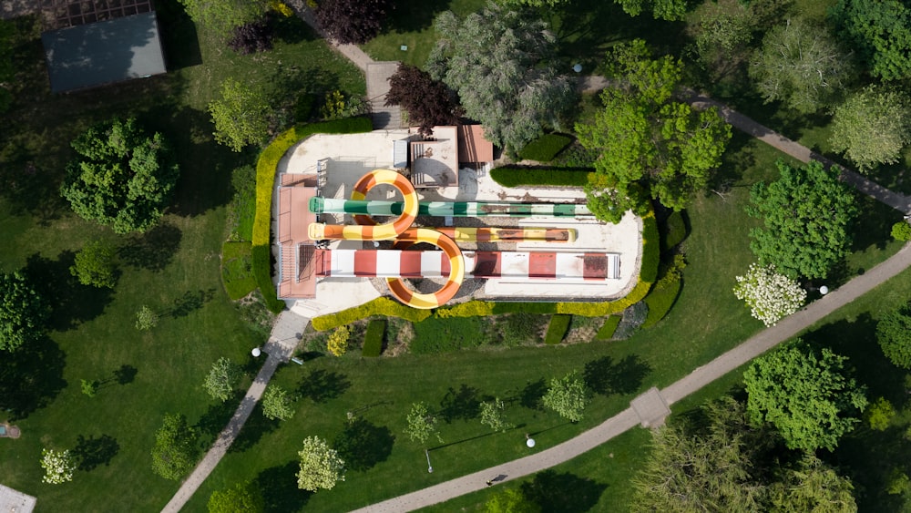 an aerial view of a playground in a park