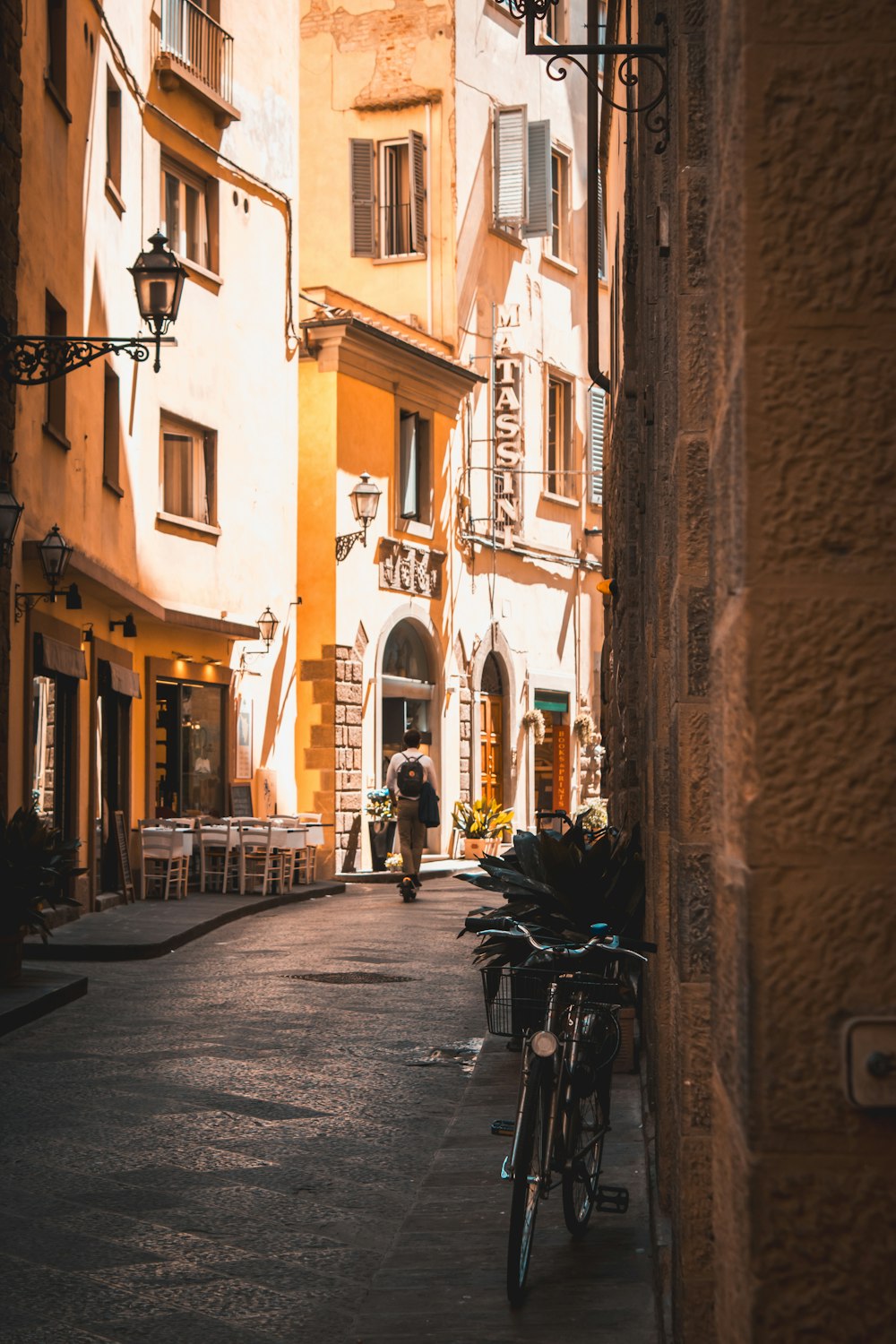 a bike parked on the side of a street