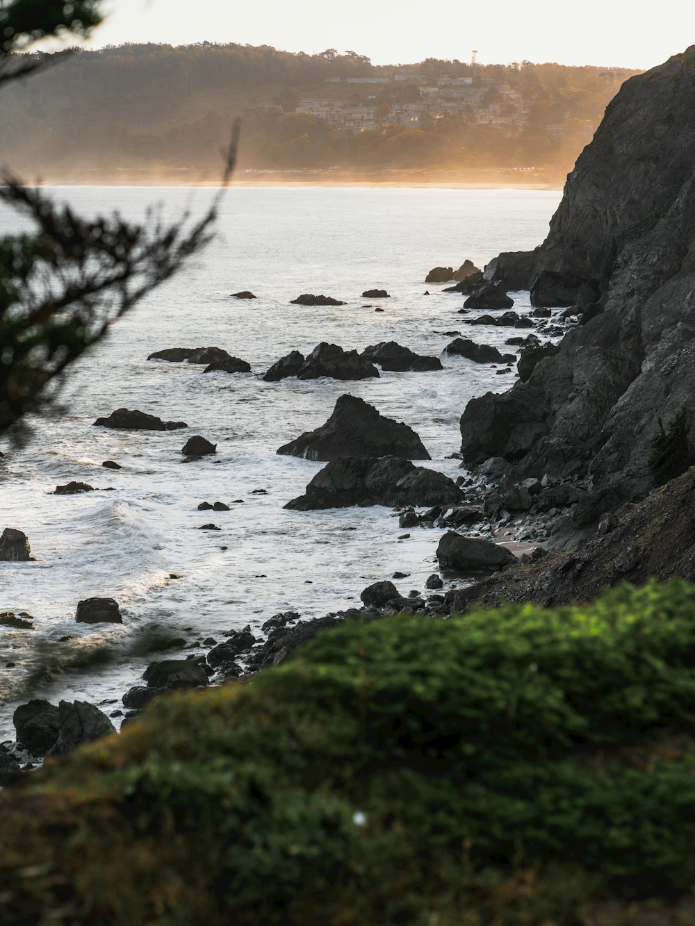 a large body of water surrounded by rocks