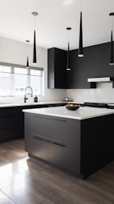 a modern kitchen with black cabinets and white counter tops