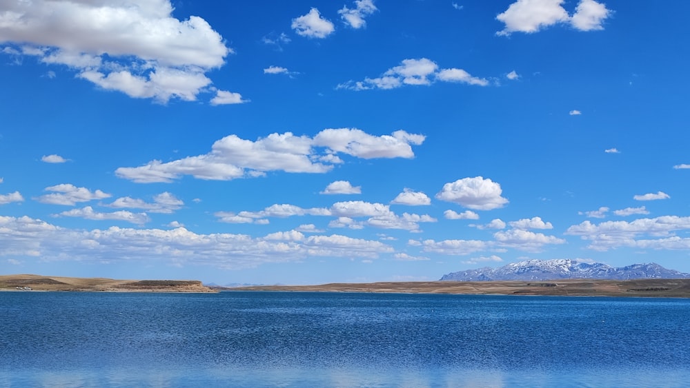 a large body of water surrounded by mountains