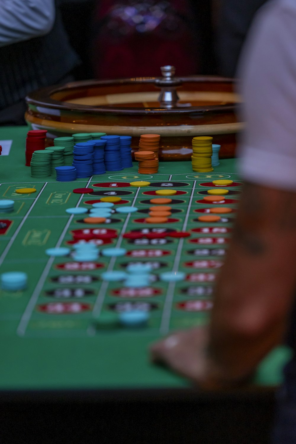 a casino table with a lot of chips on it