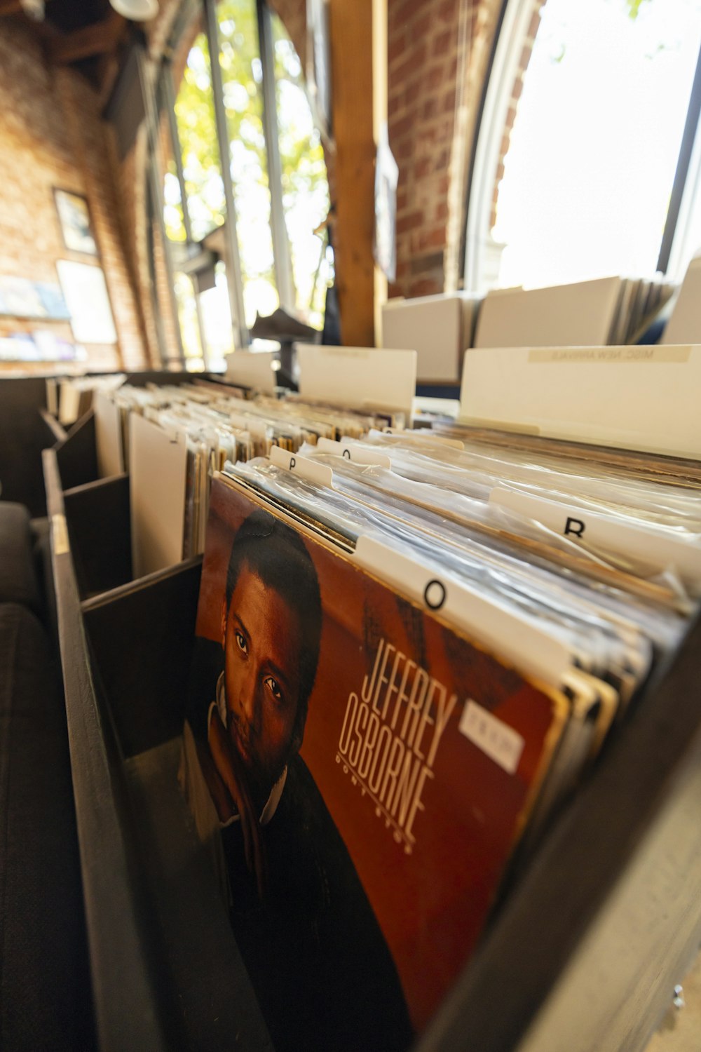 a bunch of records that are sitting on a table