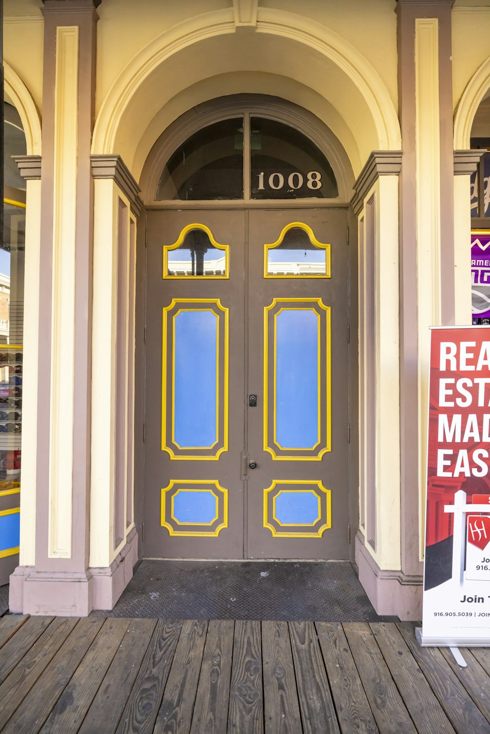 a door with a sign that says real estate mail easy