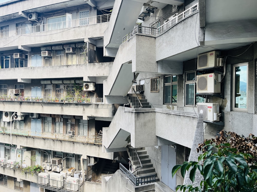 a very tall building with a bunch of balconies