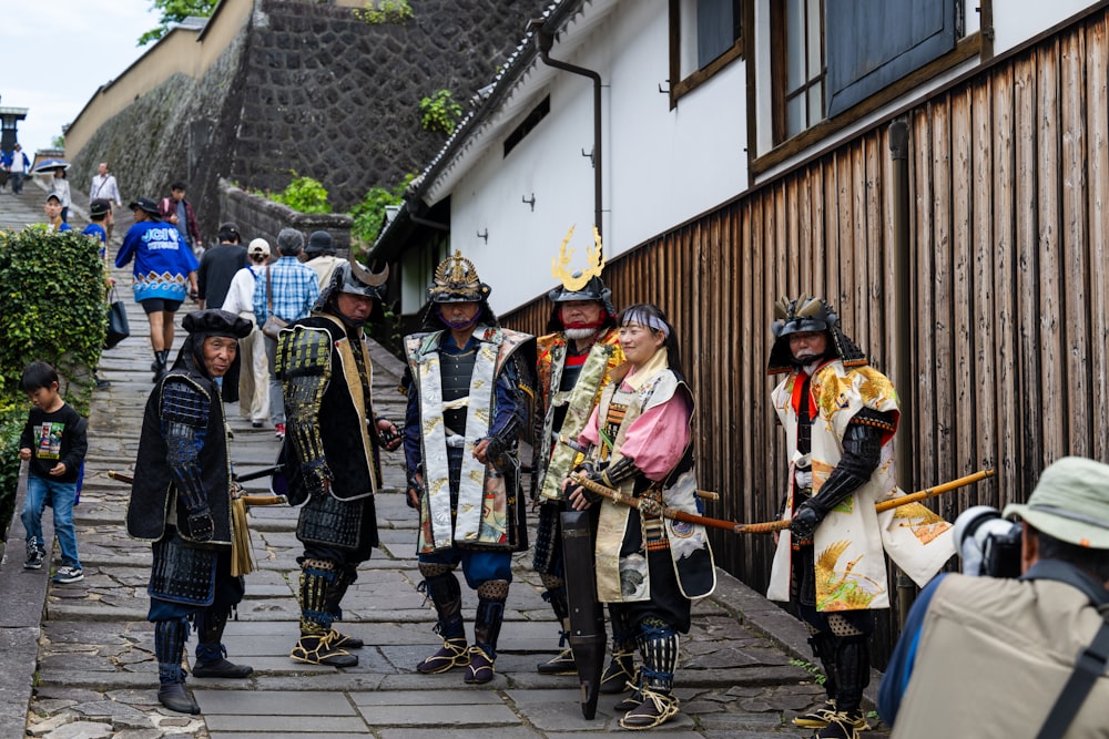 a group of people standing next to each other