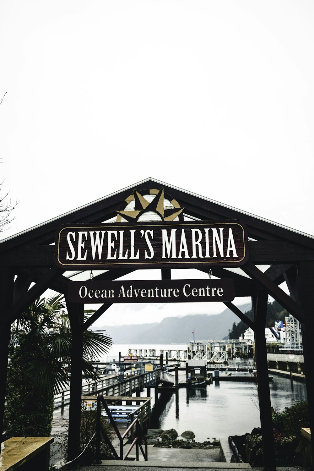 a sign that reads sewell's marina ocean adventure centre
