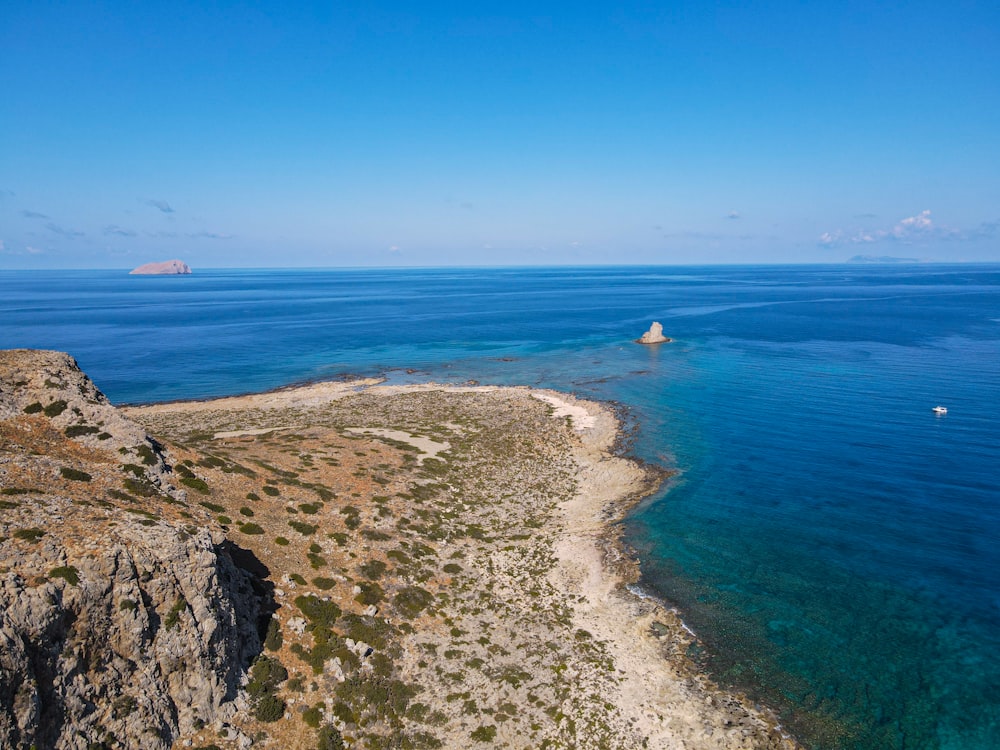 an aerial view of a beach and a body of water