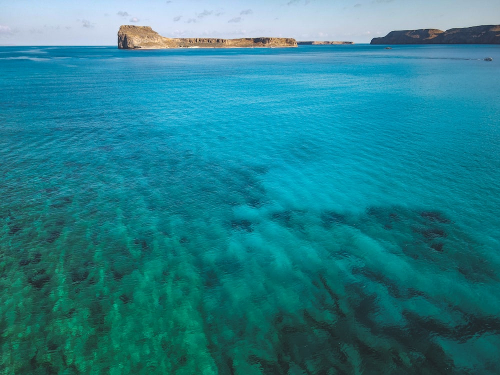 a large body of water surrounded by mountains