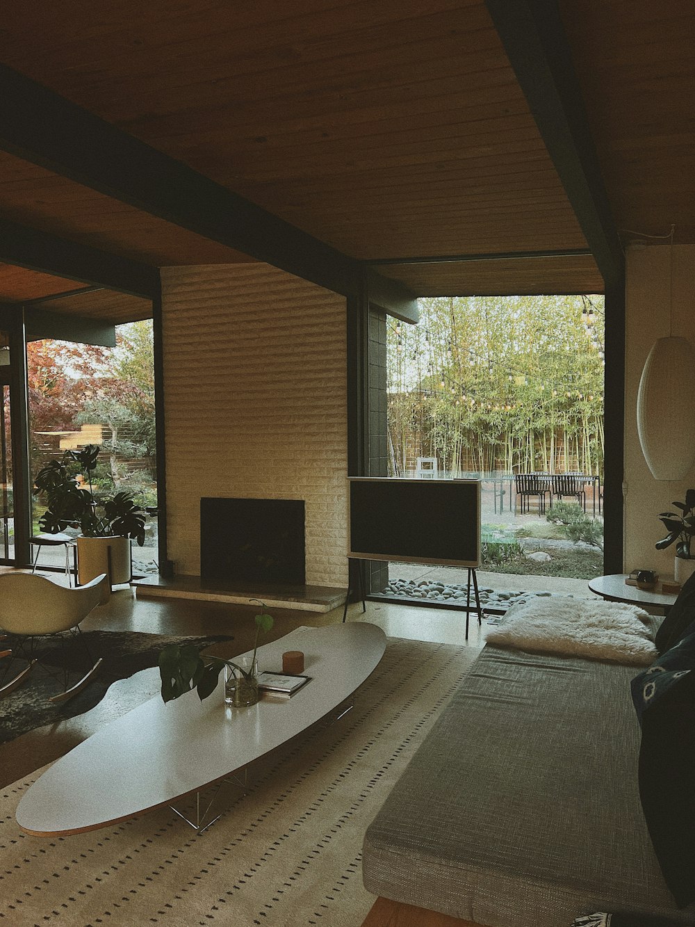 a living room filled with furniture and a flat screen tv