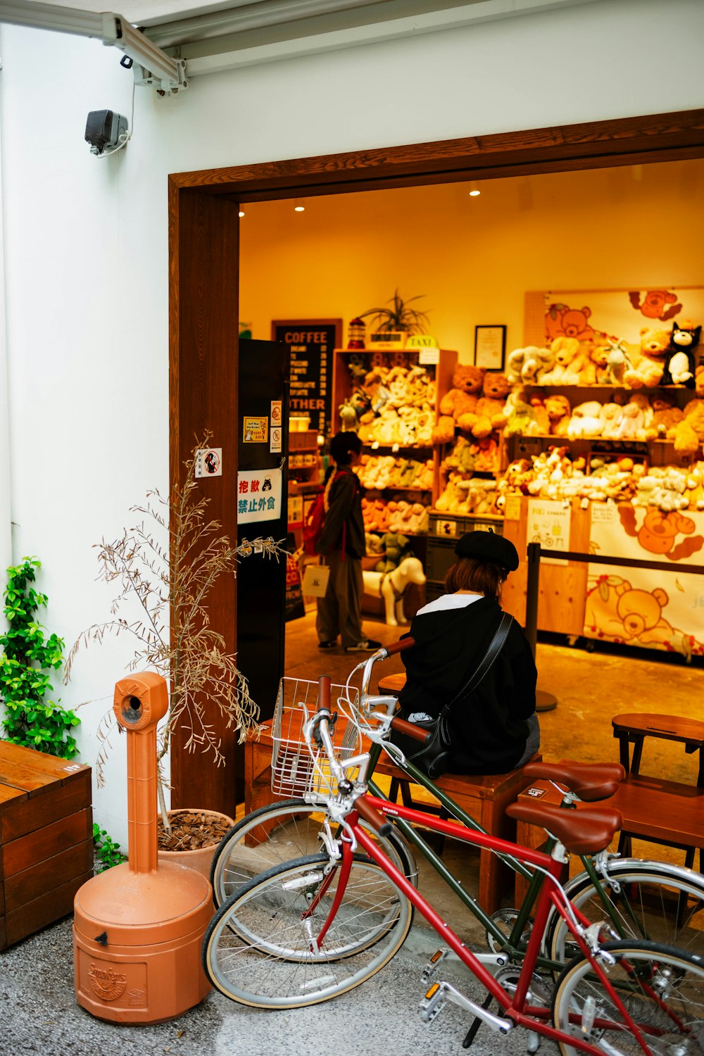 a bicycle parked in front of a store