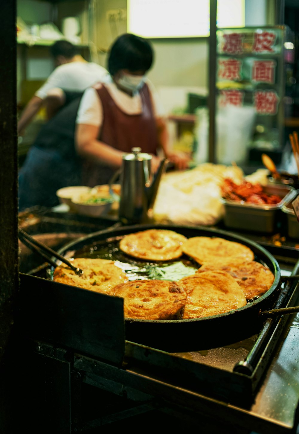 a pan of food sitting on top of a stove