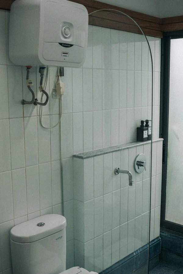 American Standard style toilet next to a walk-in shower in Texas