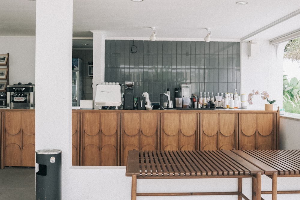 a coffee shop with wooden tables and chairs