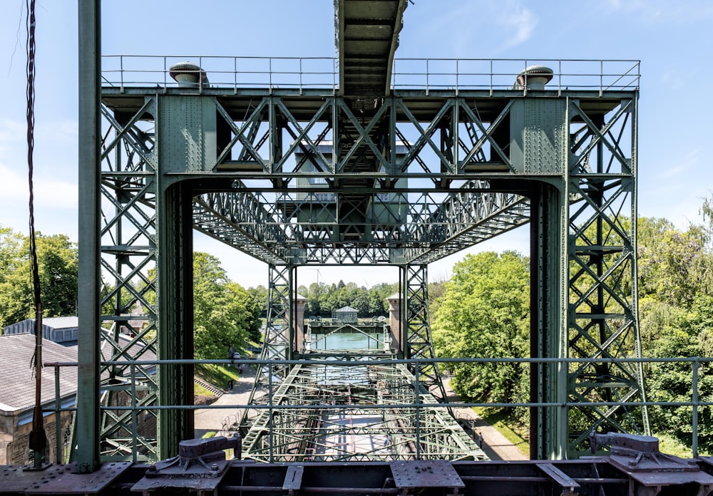 a view of a train bridge over a river