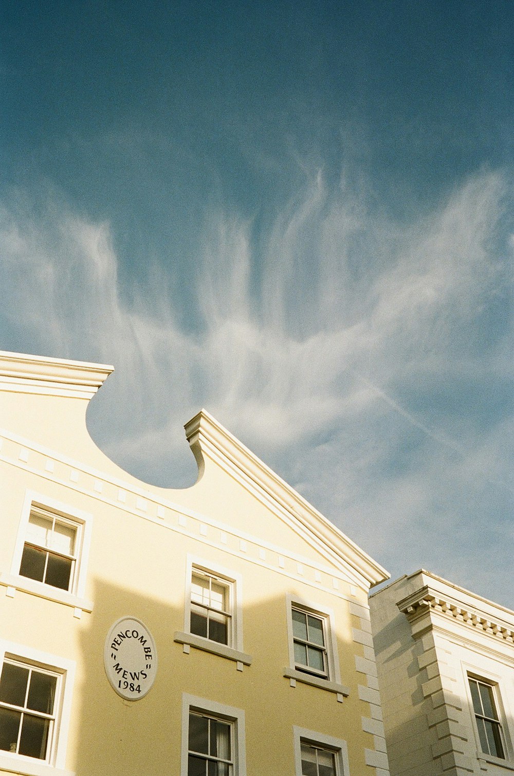 a building with a clock on the front of it