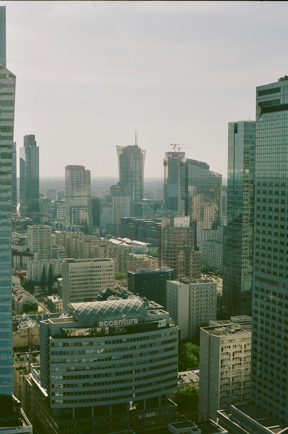 a view of a city with tall buildings