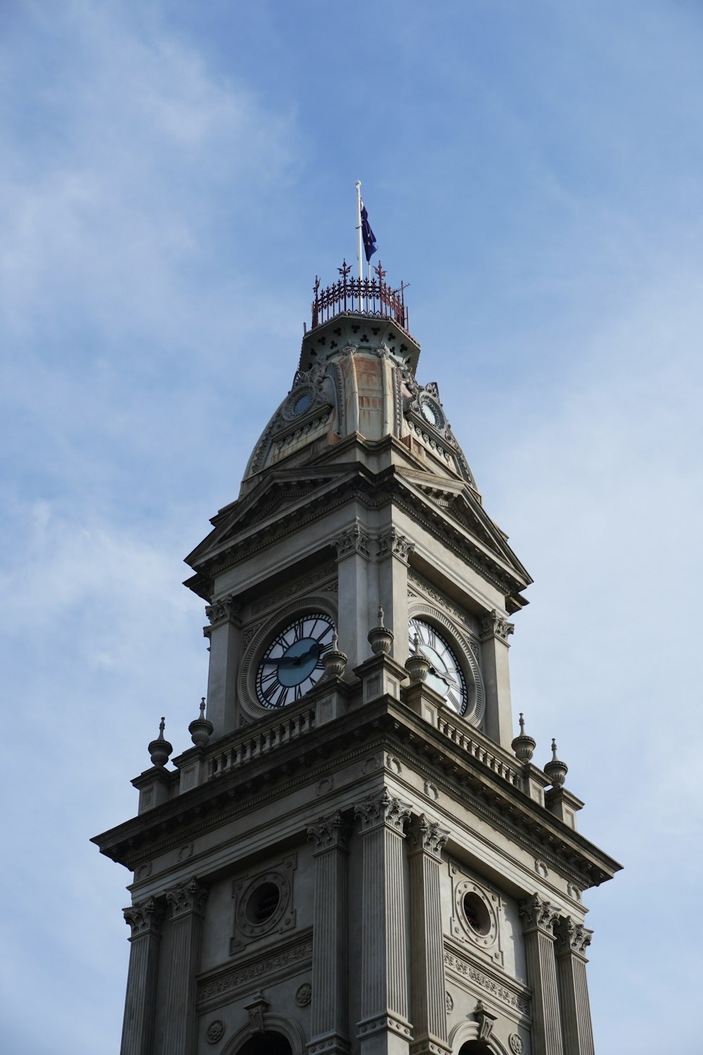 a tall clock tower with a sky background