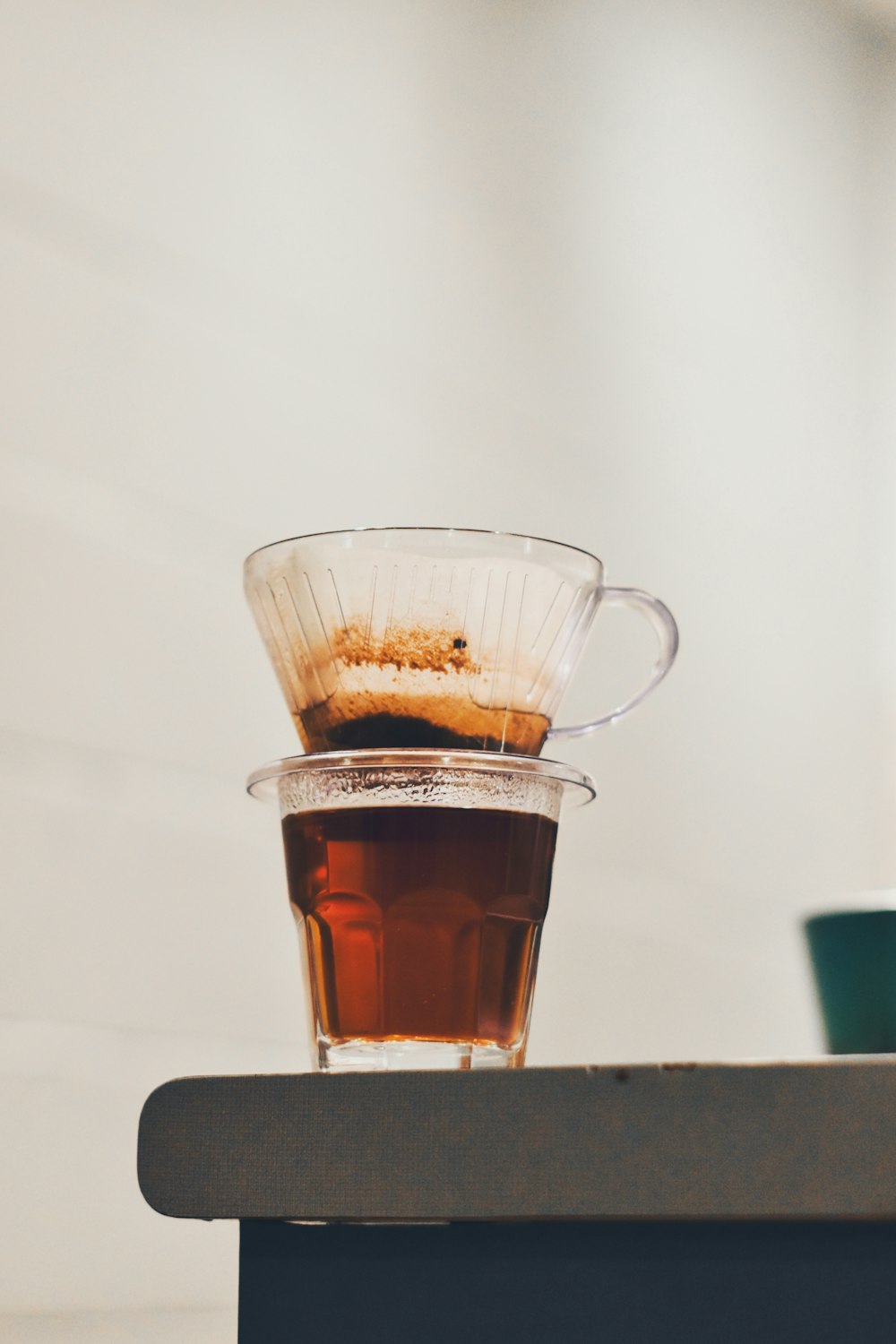 a cup of tea sitting on top of a table