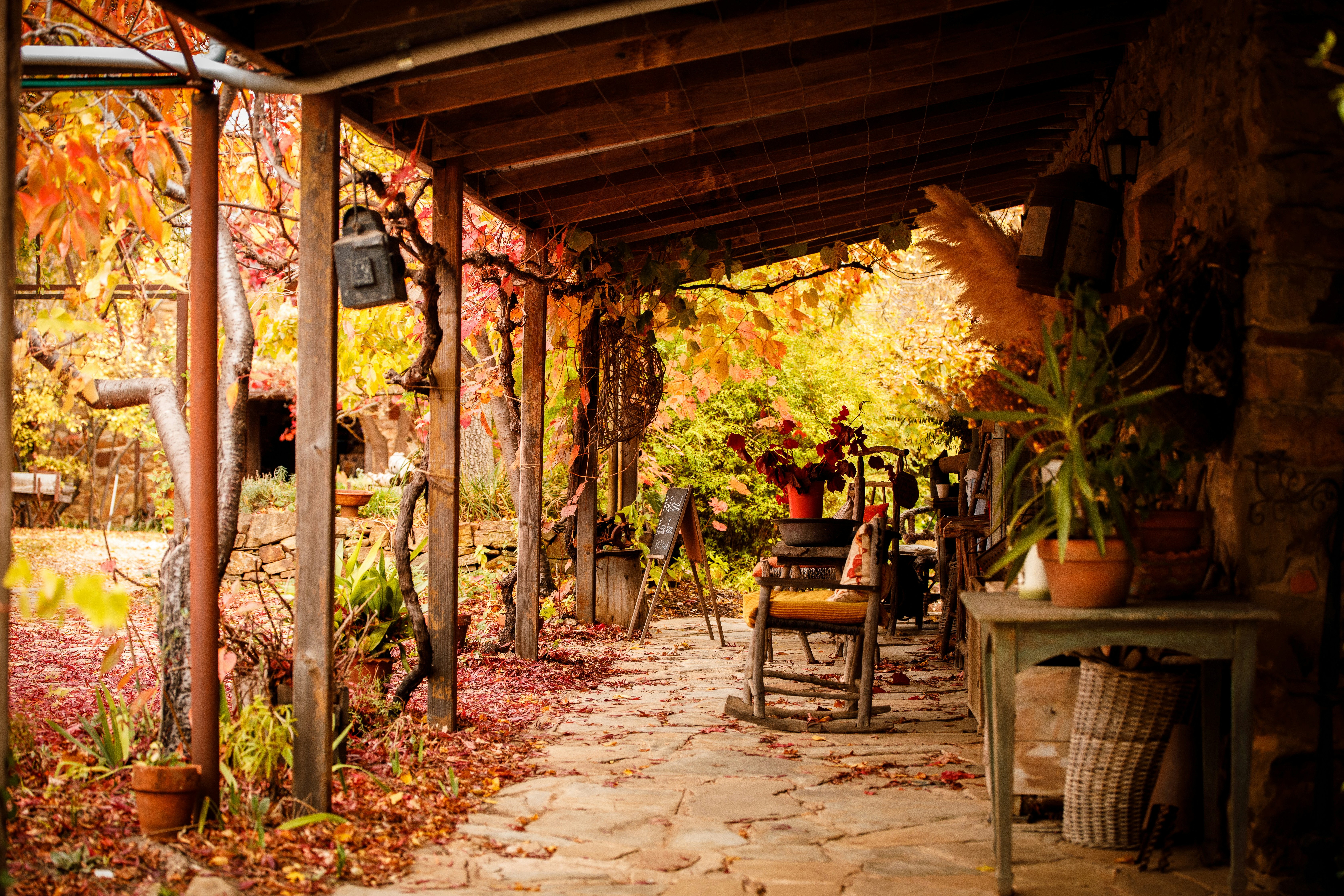 Covered patio with a table and chairs