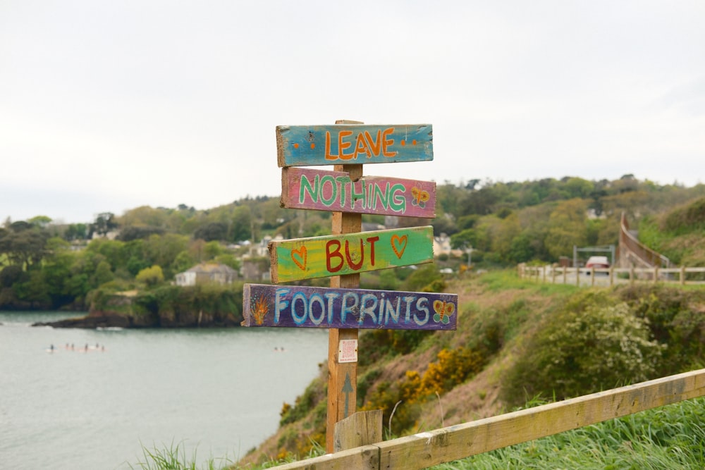 a wooden sign that has some writing on it