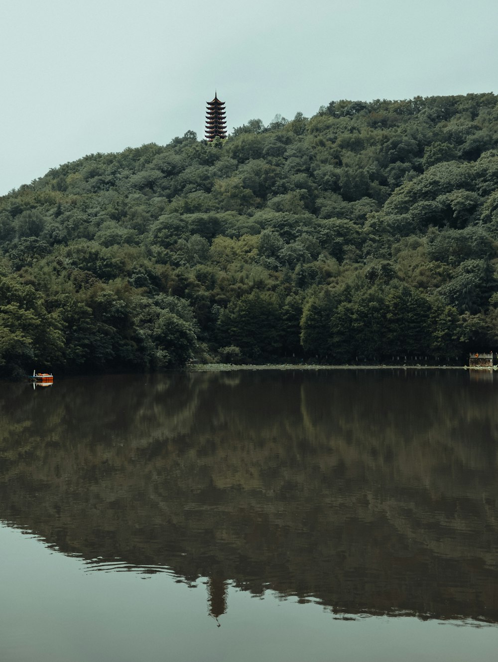 a hill with a pagoda on top of it