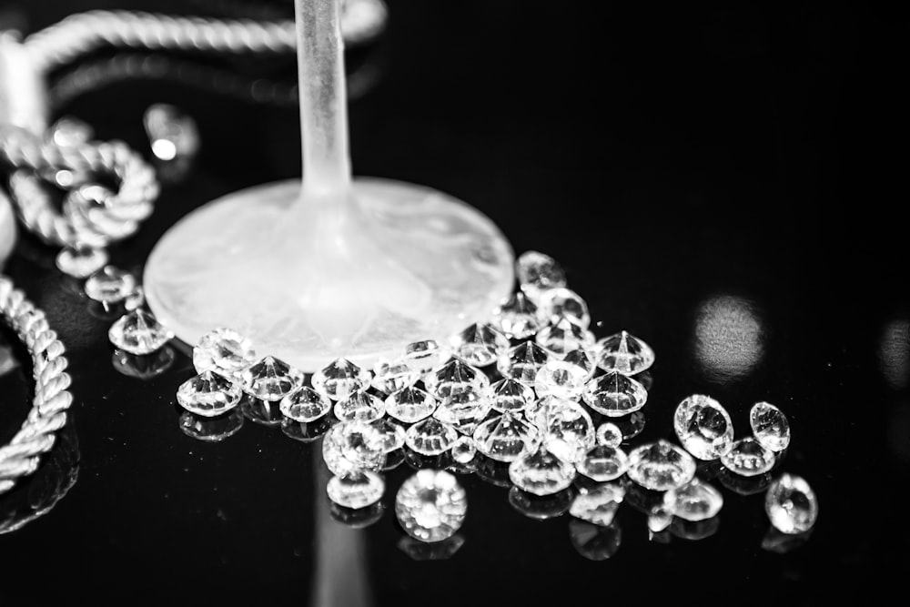 a black and white photo of a wine glass