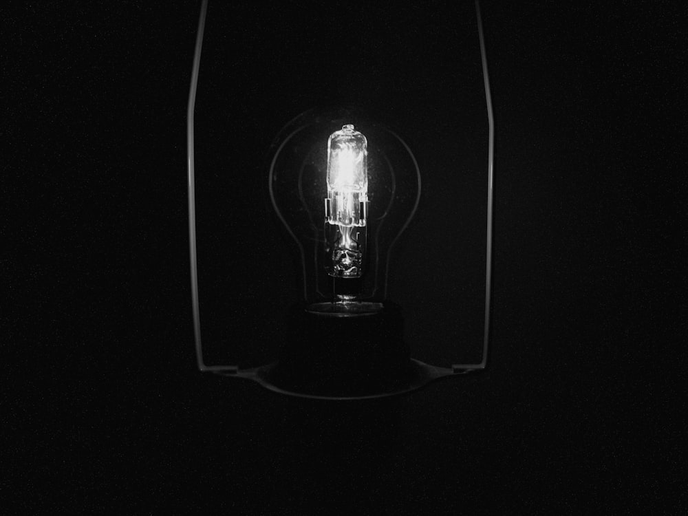 a black and white photo of a light bulb