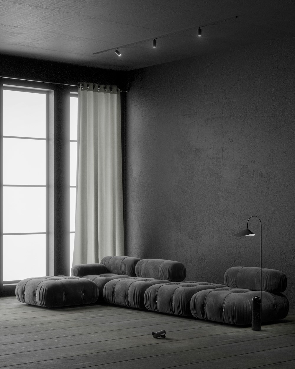 a black and white photo of a living room