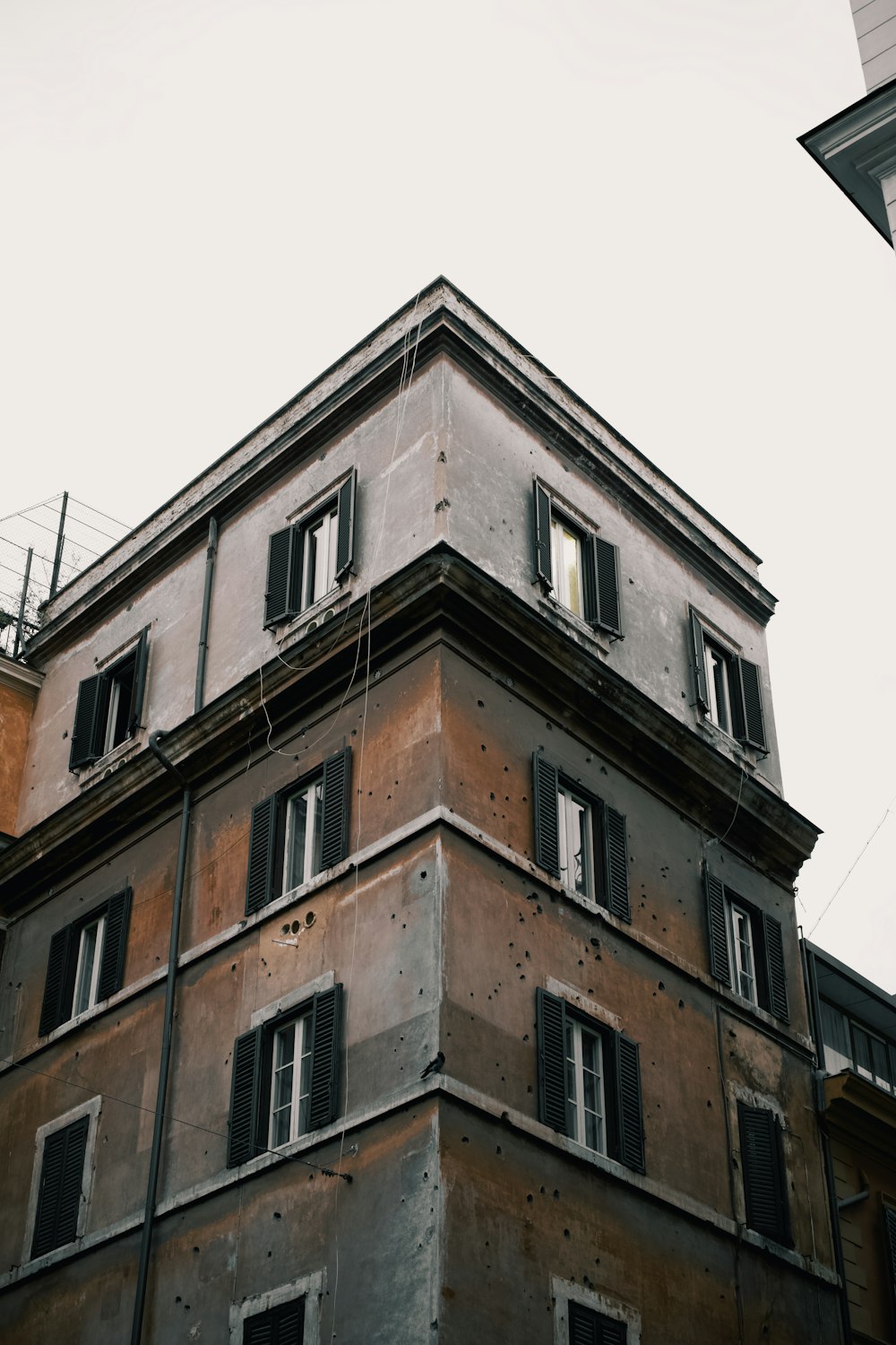 a tall building with lots of windows on top of it